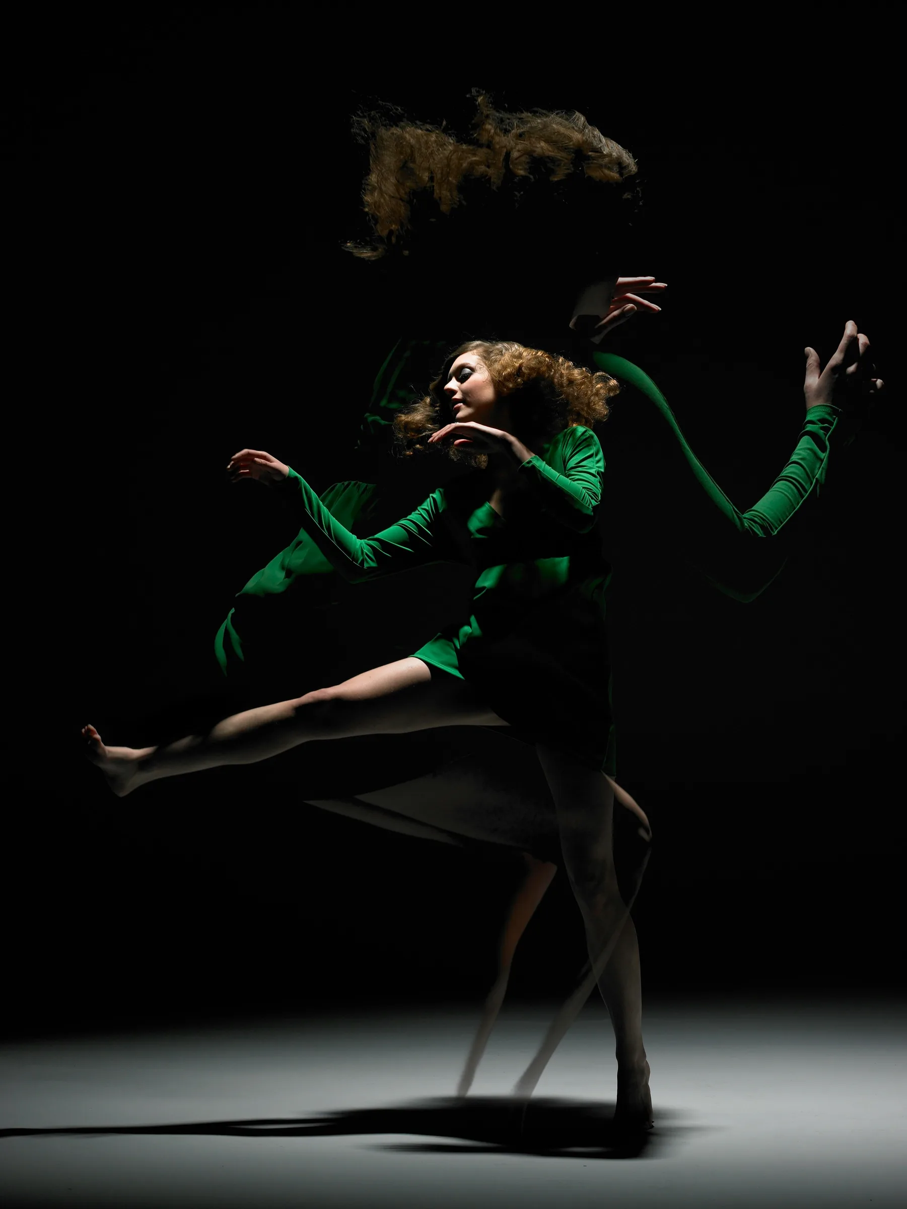 Dancer on a dark stage